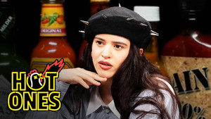 Rosalía Can't Stop Laughing While Eating Spicy Wings